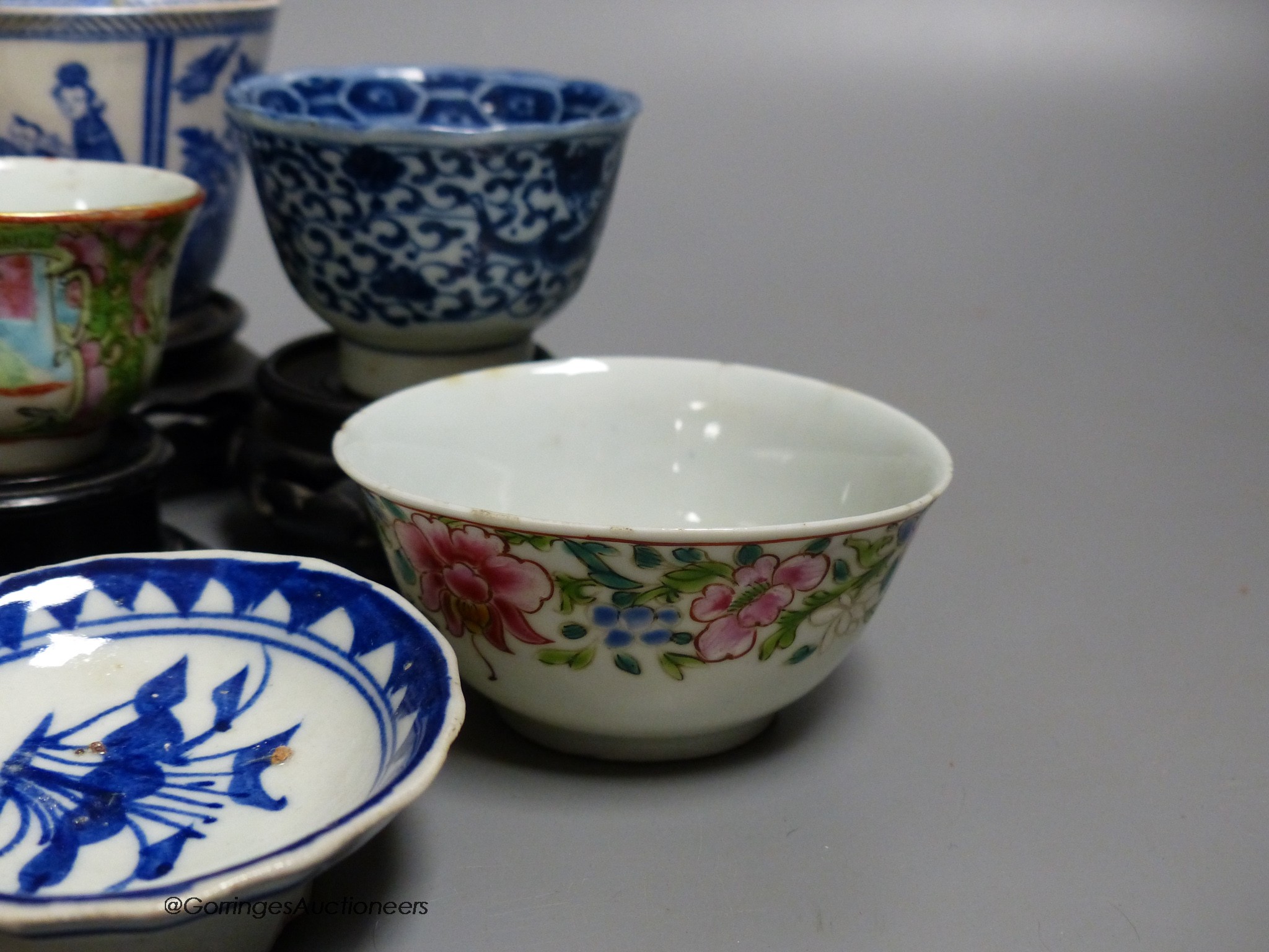 A group of Chinese porcelain tableware including teabowls and three dishes